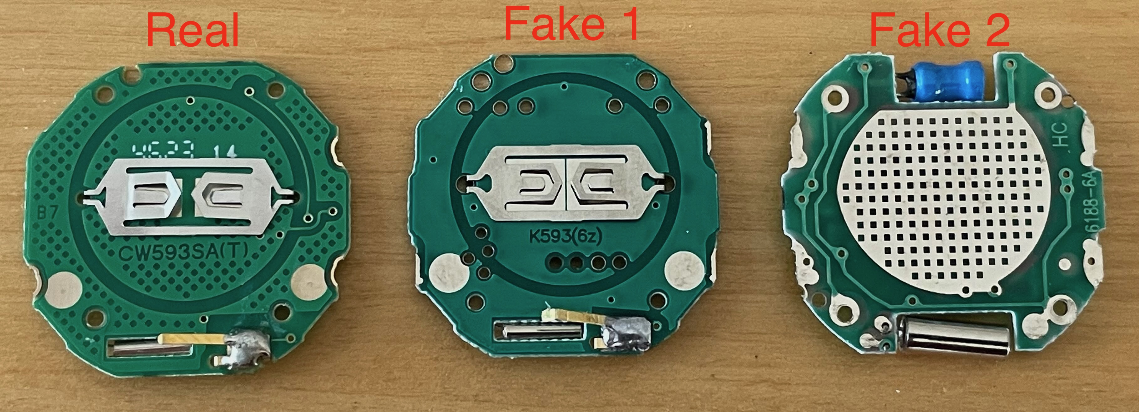 The rear of real and fake F91-W PCBs